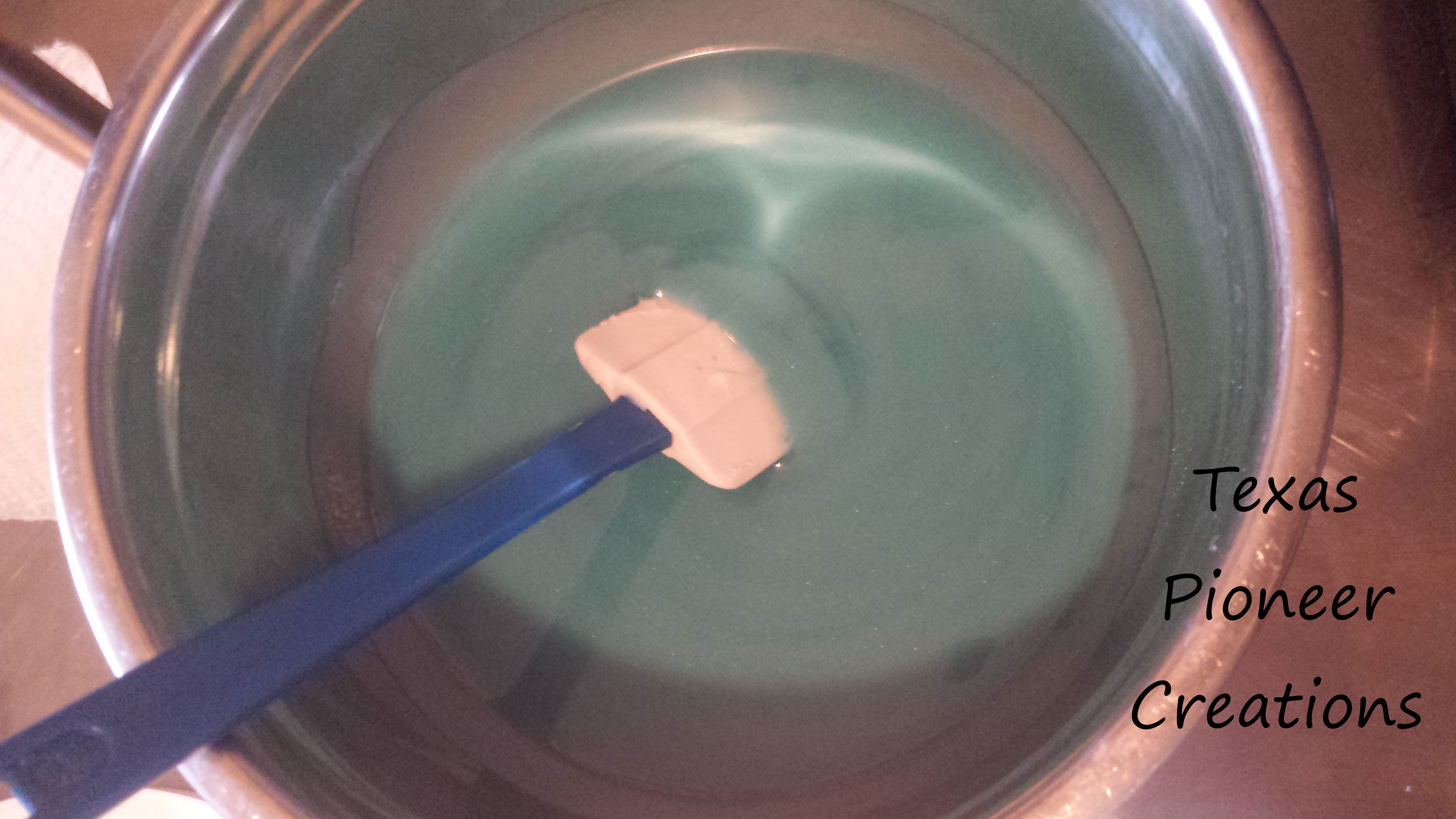Blue colorant into soap base, ready to go